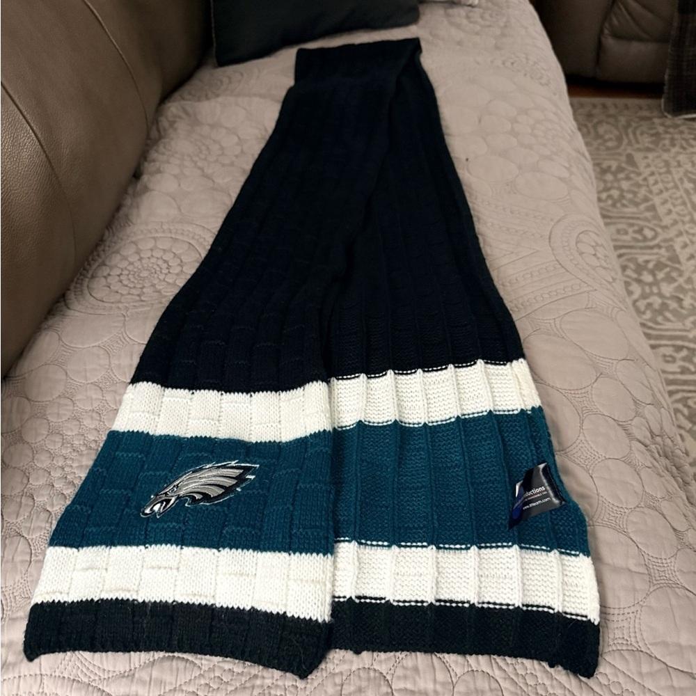 This is a Philadelphia Eagles knit scarf. 72” X  8”
